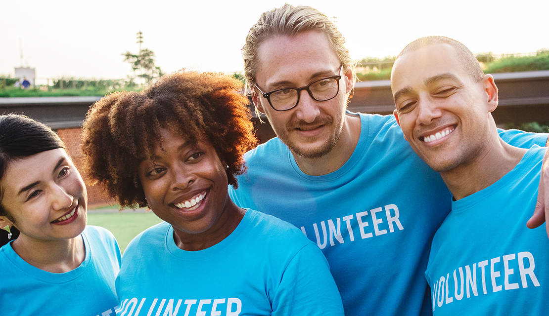 Volunteers working together for community development at Arfi Foundation